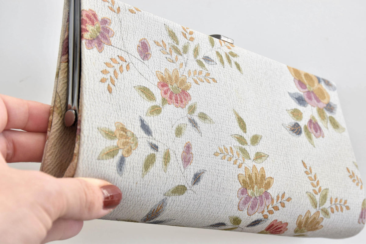Chirimen Crepe Kimono Clutch Floral Pattern corner angle view highlighting the metal hinge