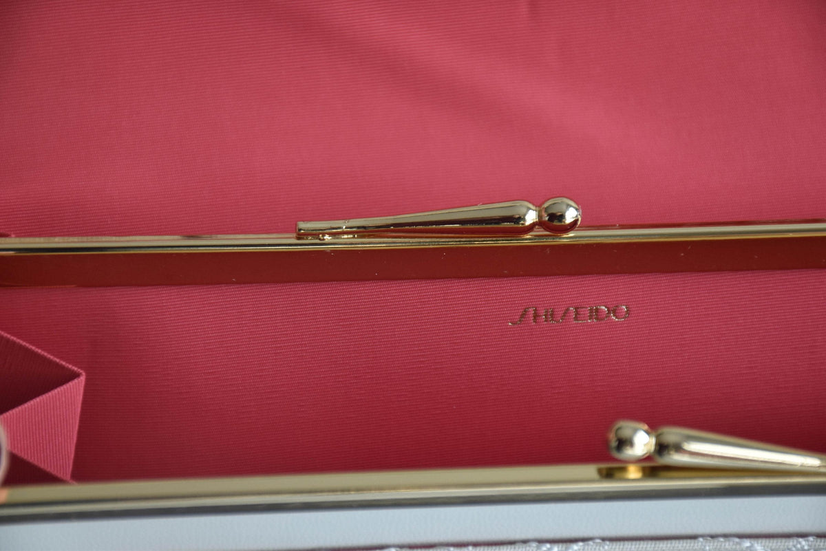 Shiseido Japanese Kimono Clutch With Traditional Weaves interior coin purse frame and brand stamp