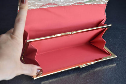 Shiseido Japanese Kimono Clutch With Traditional Weaves opened interior and kiss-lock coin purse