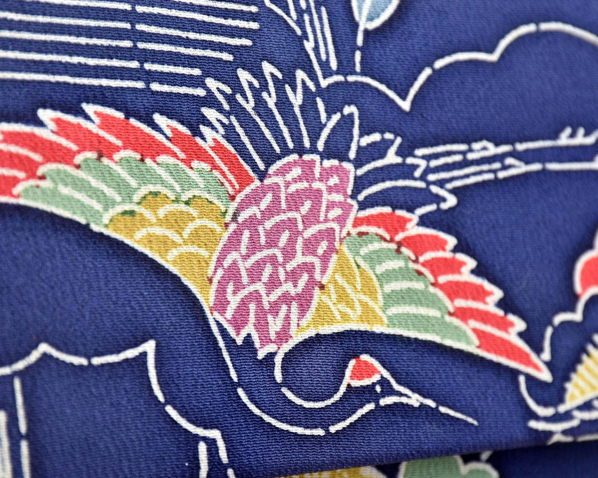 Navy Chirimen Kimono Clutch With Tsuru Crane Motif close up of the woven tsuru crane motif