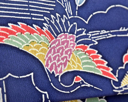 Navy Chirimen Kimono Clutch With Tsuru Crane Motif close up of the woven tsuru crane motif
