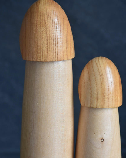 Shido Shozan kokeshi pair close-up of the snow cape hoods