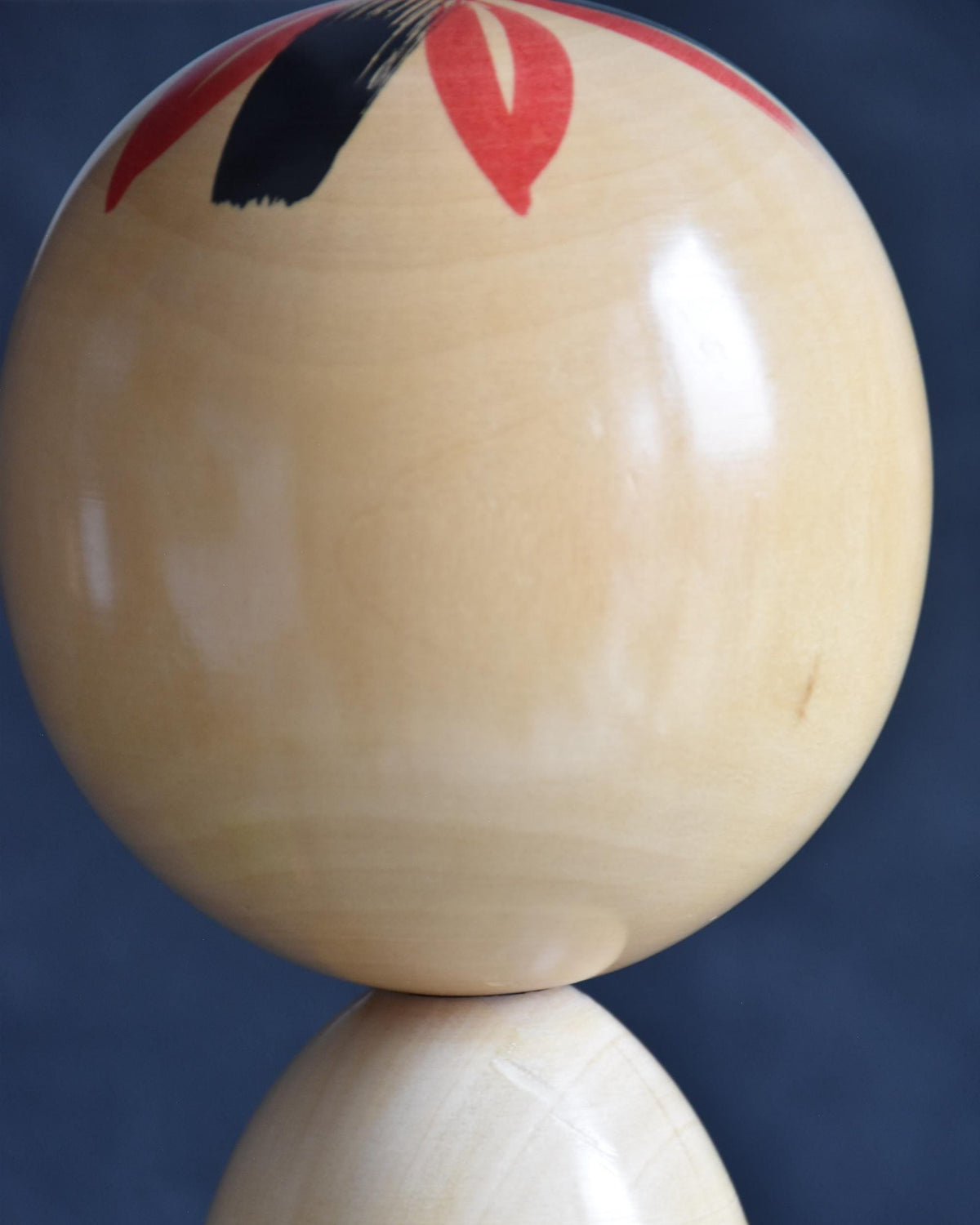 Pair of Japanese kokeshi dolls bamboo and floral motif spherical head detail
