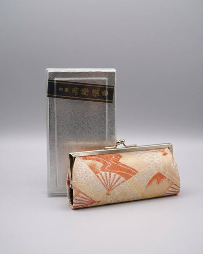 Nishijin-Ori Silk Gamaguchi Coin Purse from Kyoto featuring traditional woven brocade fabric and a metal clasp next to its