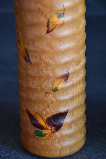 Usaburo sosaku kokeshi pattern detail showing textured wood carving