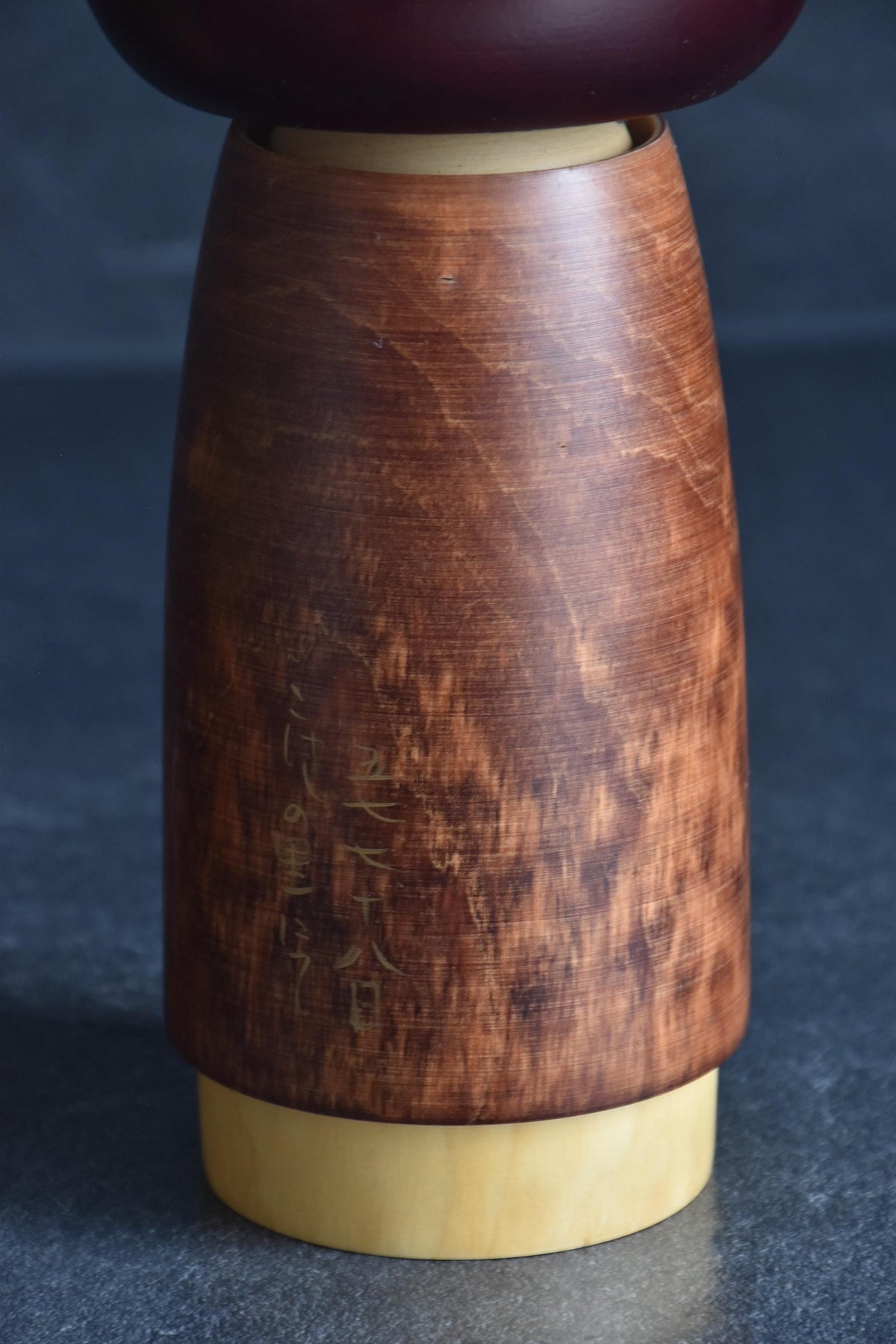 Sato Suigai Sosaku kokeshi doll Shijo base with handwritten inscription in gold ink