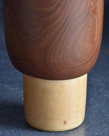Miyajima Muhitsu Sosaku Kokeshi Yuki Michi Snowy Road close up of lighter wood base and lower body