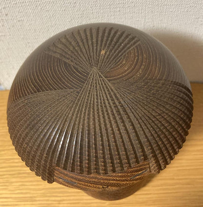 Kenichi Murakami kokeshi hair pattern detail showing intricate rhythmic wood carvings